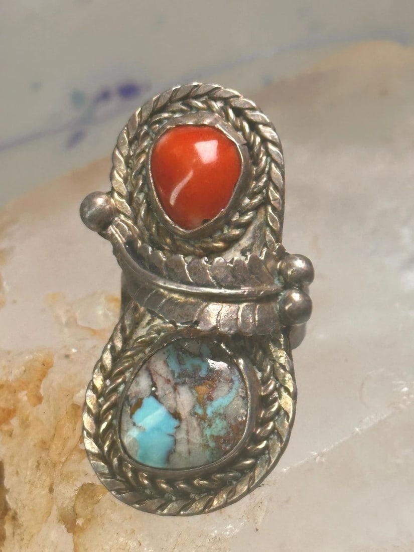 NAVAJO RING FEATHER TURQUOISE CORAL SIZE 6.75 STERLING SILVER WOMEN: NAVAJO RING FEATHER TURQUOISE CORAL SIZE 6.75 STERLING SILVER WOMEN Navajo ring feather turquoise coral size 6.75 sterling silver women Size 6.75 Weight 11.5g Length 1 5/8" Width 7/8" Thinnest part of
