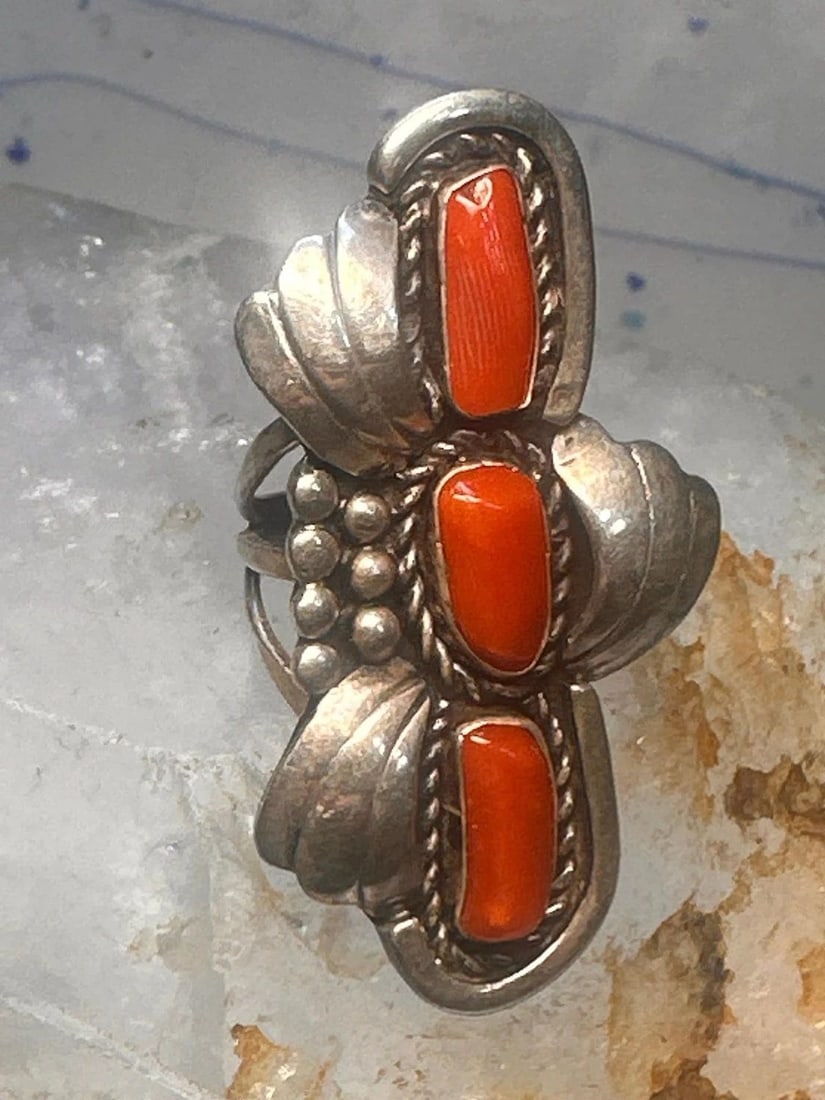 NAVAJO LONG RING CORAL SIZE 5.5 STERLING SILVER WOMEN: NAVAJO LONG RING CORAL SIZE 5.5 STERLING SILVER WOMEN Navajo long ring coral size 5.5 sterling silver women Size 5.5 Weight 14.8g Length 2" Width 1" Thinnest part of band 3/16"