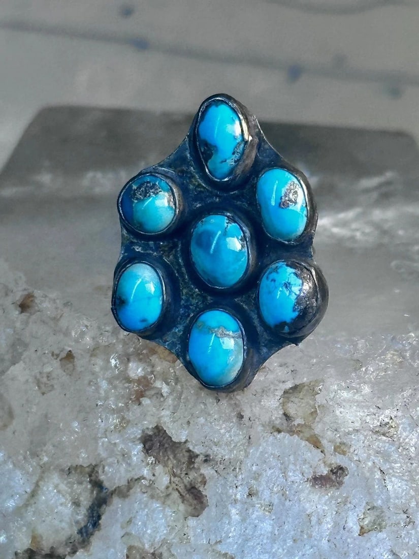 ZUNI RING TURQUOISE FLOWER SIZE 6.5 STERLING SILVER WOMEN: ZUNI RING TURQUOISE FLOWER SIZE 6.5 STERLING SILVER WOMEN Zuni Ring Turquoise Flower size 6.5 sterling silver women Size 6.50 Weight 7.2g Length 1 1/4" Width 7/8" Thinnest part of band 1/8"