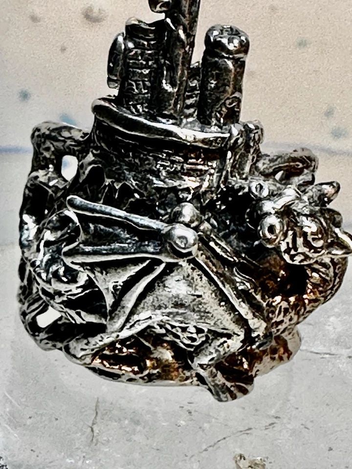 CASTLE RING DRAGON MEDIEVAL RENAISSANCE BAND SIZE 8.75 STERLING SILVER WOMEN: CASTLE RING DRAGON MEDIEVAL RENAISSANCE BAND SIZE 8.75 STERLING SILVER WOMEN Castle ring dragon Medieval Renaissance band size 8.75 sterling silver women Size 8.75 Weight 16.4g Widest part of band 1 1