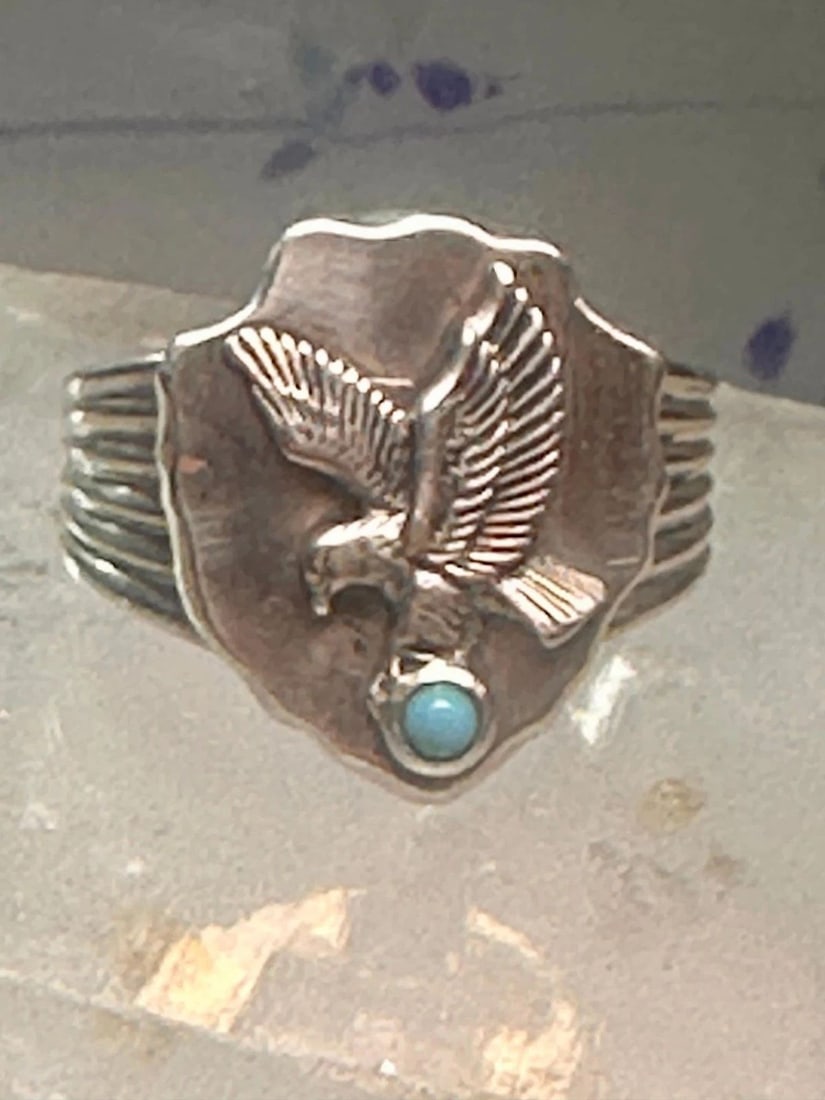 EAGLE RING W ARROW TURQUOISE BAND SOUTHWEST SIGNED FM SIZE 11 STERLING SILVER ME: EAGLE RING W ARROW TURQUOISE BAND SOUTHWEST SIGNED FM SIZE 11 STERLING SILVER ME Eagle ring w arrow turquoise band southwest signed FM size 11 sterling silver men women Size. 11 Weight 18.8g Length 7/