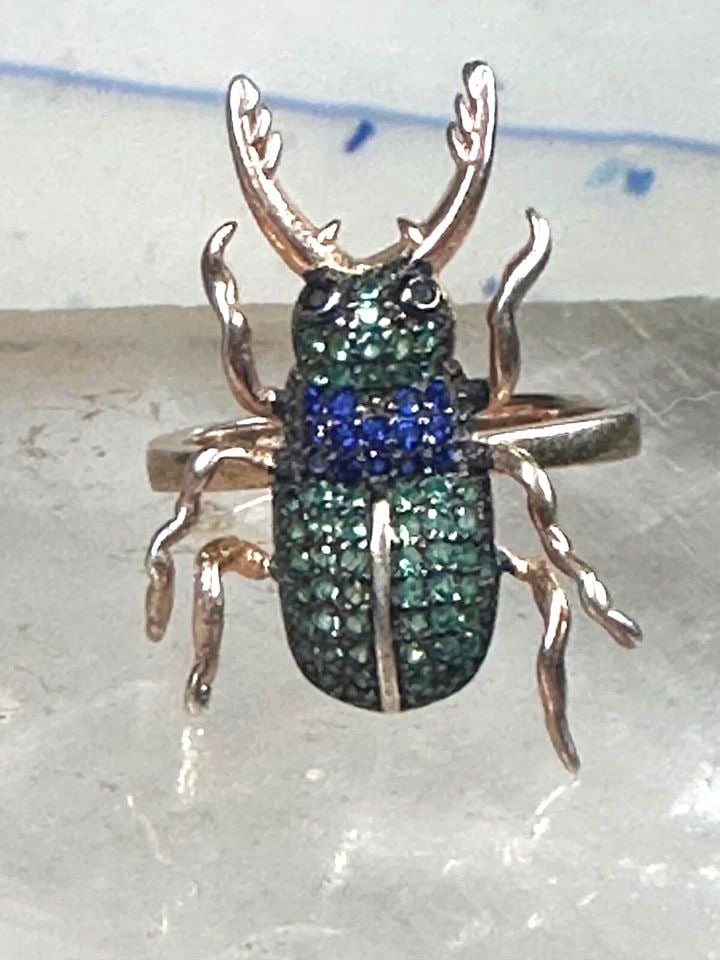 INSECT RING BUG BEETLE VERMEIL SIZE 6 STERLING SILVER WOMEN: INSECT RING BUG BEETLE VERMEIL SIZE 6 STERLING SILVER WOMEN Insect ring bug beetle Vermeil size 6 sterling silver women Unknown gold over sterling silver - Vermeil Size 6 Weight 3.6g Length 1" Width 5