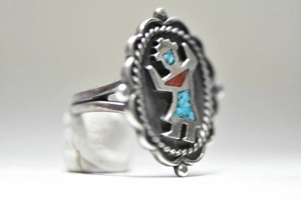RAINBOW MAN ZUNI TURQUOISE STERLING SILVER WOMEN SIZE 7.50: RAINBOW MAN ZUNI TURQUOISE STERLING SILVER WOMEN SIZE 7.50 Rainbow man Kachina turquoise sterling silver women Size 7.50 Between a Size 7.50 and a Size 7.75 Weight . 8.4g Length of front of ring 1 1/8
