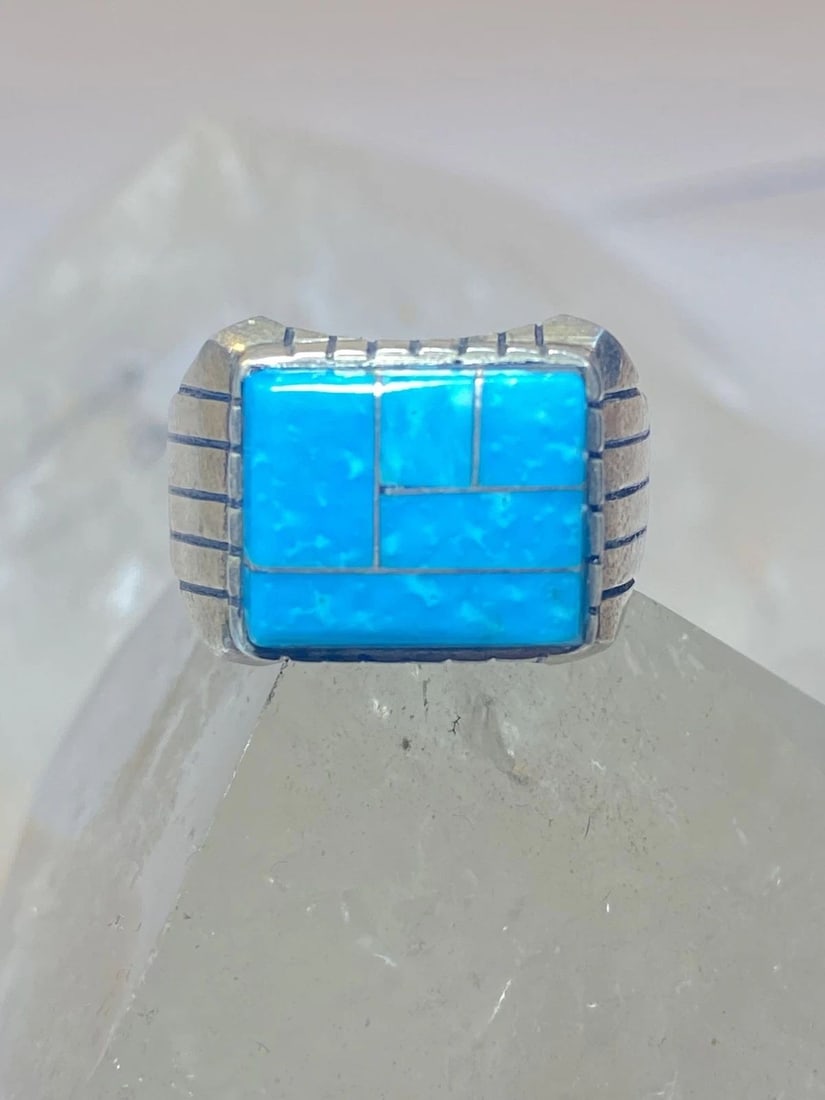 BLUE RING SIZE 8.75 STERLING SILVER BAND SOUTHWEST: BLUE RING SIZE 8.75 STERLING SILVER BAND SOUTHWEST Blue ring sterling silver band southwest Size 8.75 Between a size 8.75 and a size 9 Weight 10.3g Length. 1/2" Width 5/8" Thinnest part of band 1/8"