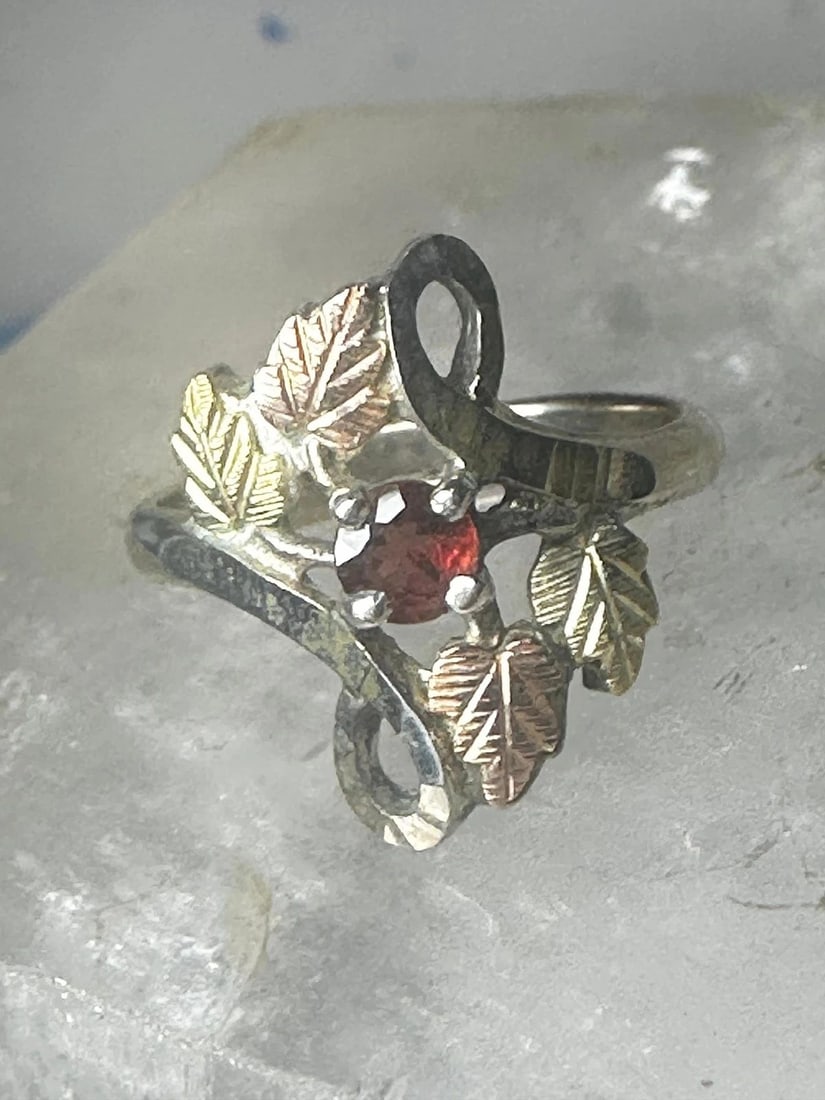BLACK HILLS GOLD RING SIZE 5.75 GARNET LEAVES STERLING SILVER WOMEN GIRLS: BLACK HILLS GOLD RING SIZE 5.75 GARNET LEAVES STERLING SILVER WOMEN GIRLS Black Hills Gold ring size 5.75 garnet leaves sterling silver women girls 12K over sterling silver on the leaves Size 5.75 Wei