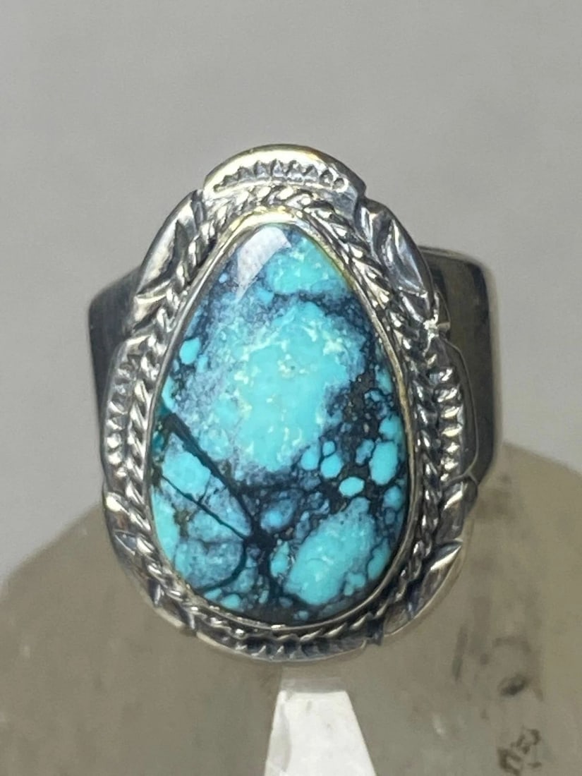 TURQUOISE RING TEARDROP BOHO BAND STERLING SILVER MEN WOMEN: TURQUOISE RING TEARDROP BOHO BAND STERLING SILVER MEN WOMEN Turquoise ring size 6.25 Teardrop boho band sterling silver men women Size 6.25 Between a size 6.25 and a size 6.50 Weight. 13g Length. 1" W