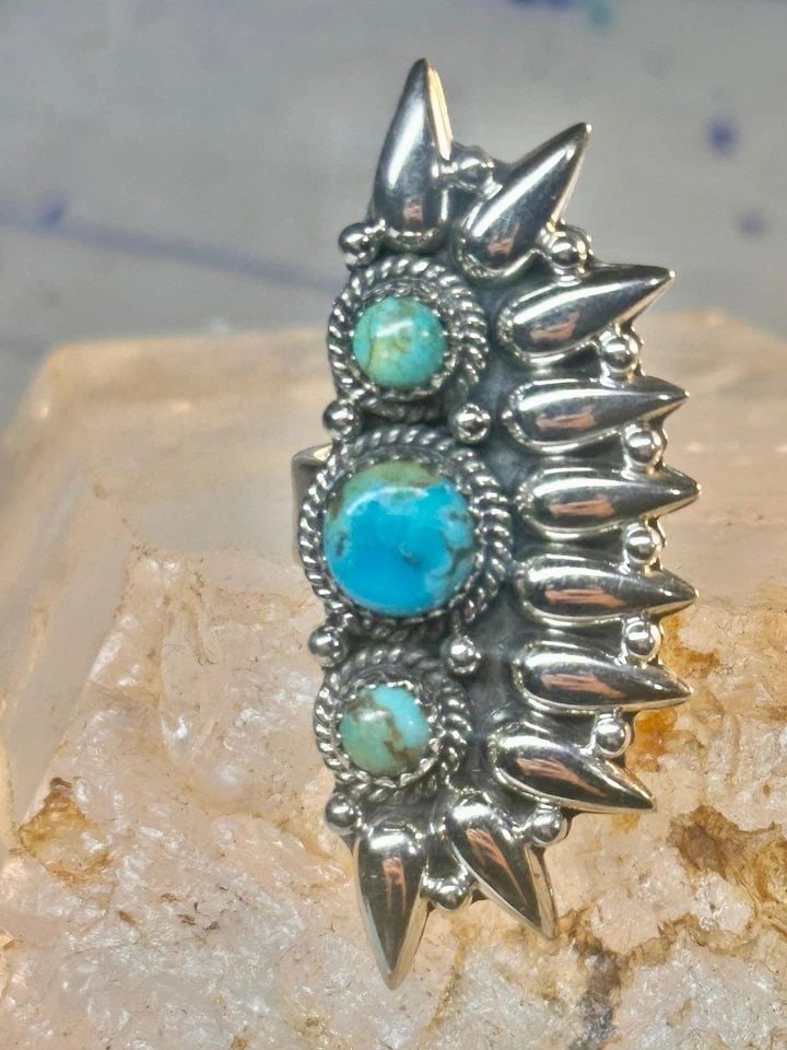 LONG TURQUOISE RING SOUTHWEST SIZE 7 STERLING SILVER WOMEN: LONG TURQUOISE RING SOUTHWEST SIZE 7 STERLING SILVER WOMEN Long turquoise ring southwest size 7 Sterling silver women Size 7 slightly adjustable one band is made to be adjusted Weight 13.7g Length 1 7