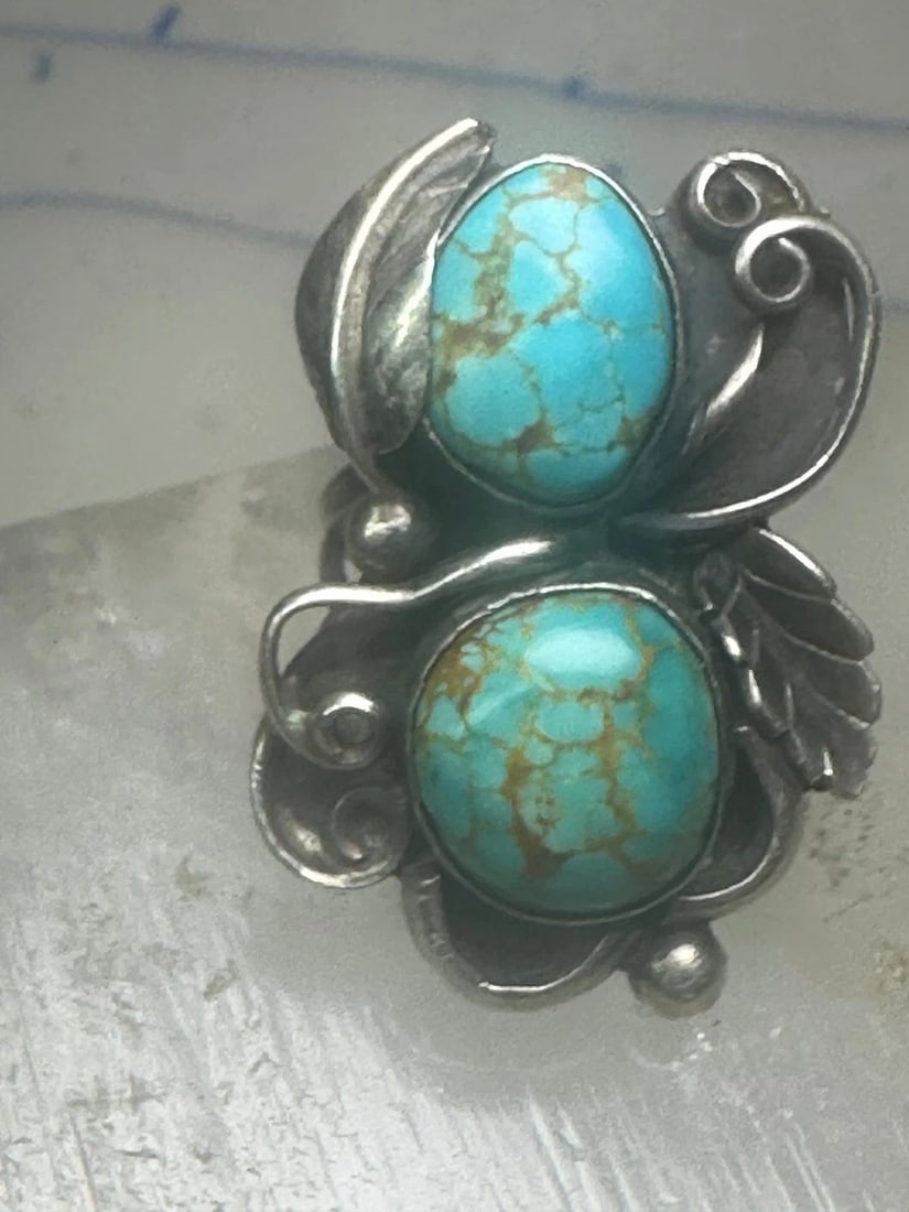 NAVAJO RING LONG TURQUOISE SIZE 5 STERLING SILVER WOMEN GIRLS: NAVAJO RING LONG TURQUOISE SIZE 5 STERLING SILVER WOMEN GIRLS Navajo ring long turquoise size 5 sterling silver women girls Size 5 Weight 11.1g Length 1 3/8" Width 1" Band in back 1/8"