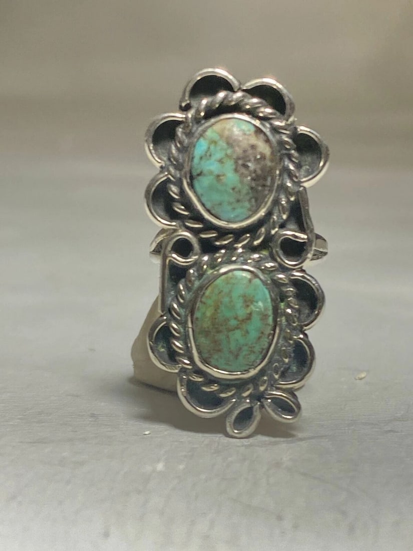 LONG TURQUOISE RING NAVAJO SOUTHWEST STERLING SILVER WOMEN GIRLS LC: LONG TURQUOISE RING NAVAJO SOUTHWEST STERLING SILVER WOMEN GIRLS LC long Turquoise ring Navajo southwest sterling silver women girls Signed LC Size 4.75 Weight 6.1g Length 1. 3/8" Width 5/8"