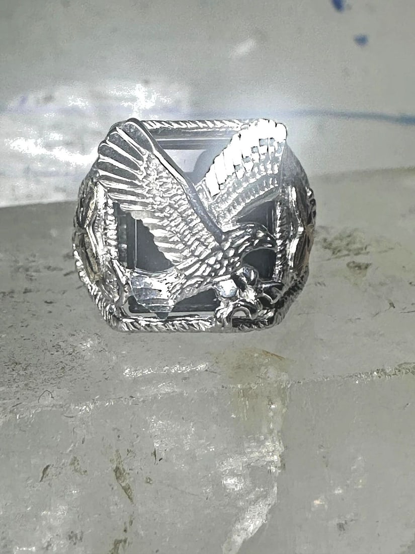 EAGLE RING BLACK HILLS GOLD ONYX BAND STERLING SILVER WOMEN MEN: EAGLE RING BLACK HILLS GOLD ONYX BAND STERLING SILVER WOMEN MEN Eagle ring Black Hills Gold onyx band sterling silver women men Size 8.75 Weight 8.8 Length 5/8" Width 5/8" Band in back 3/16"