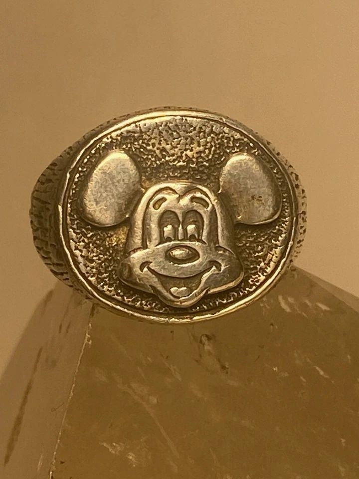 MOUSE RING BAND STERLING SILVER WOMEN SIZE 6.5: MOUSE RING BAND STERLING SILVER WOMEN SIZE 6.5 Mouse ring Walt band sterling silver women Size 6.50 Weight 10.5g Length 5/8" Widest part 5/8" Thinnest part of band 1/4"