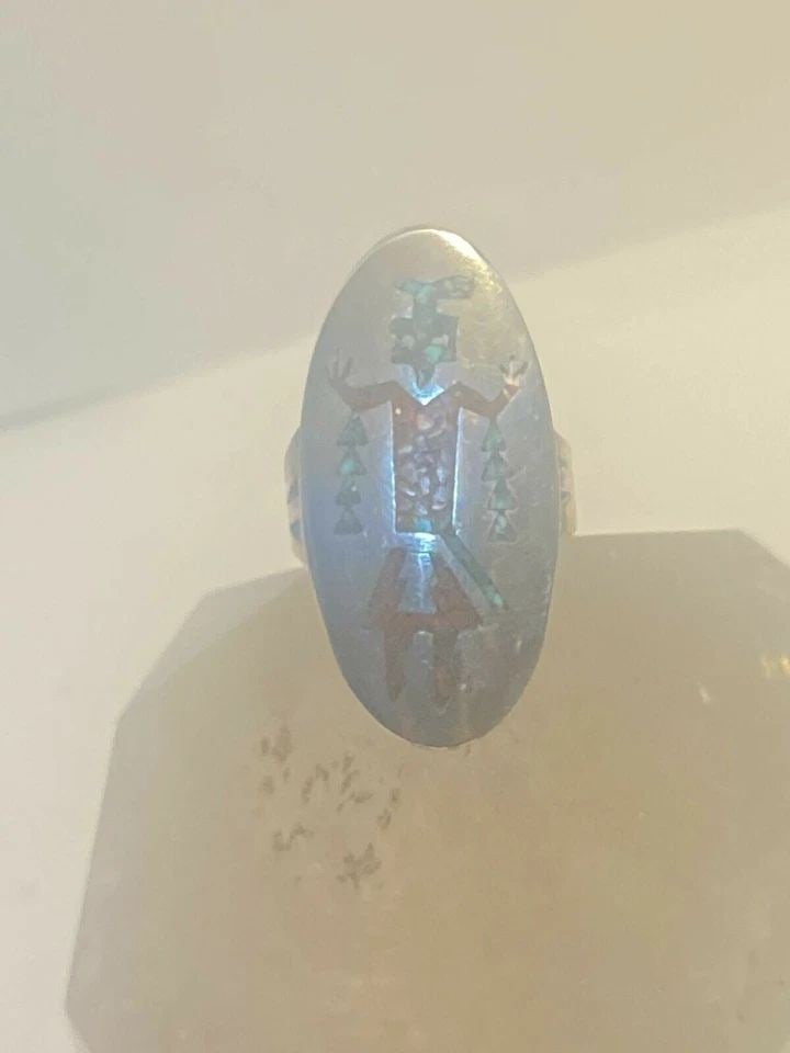 KACHINA RING TURQUOISE CHIPS CORAL CHIPS LONG STERLING SILVER WOMEN: KACHINA RING TURQUOISE CHIPS CORAL CHIPS LONG STERLING SILVER WOMEN Kachina ring turquoise chips coral chips long sterling silver women Signed JTS Size 7.25 Between a size 7.25 and a size 7.50 Weight.