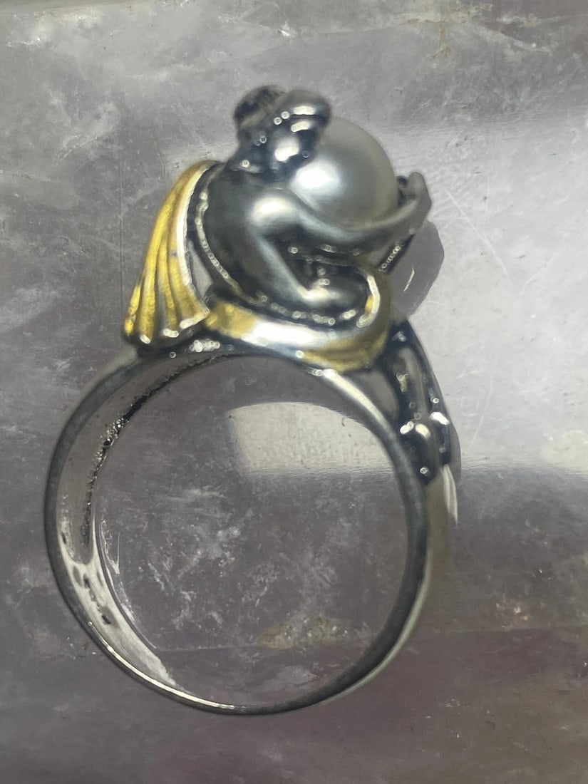 NAKED LADY RING HOLDING PEARL BAND STERLING SILVER WOMEN SIZE 8: NAKED LADY RING HOLDING PEARL BAND STERLING SILVER WOMEN SIZE 8 Naked lady ring holding pearl band sterling silver women Size 8 Weight 7.7g Widest part. 3/8"" Thinnest part of band 3/16"" Rise from th