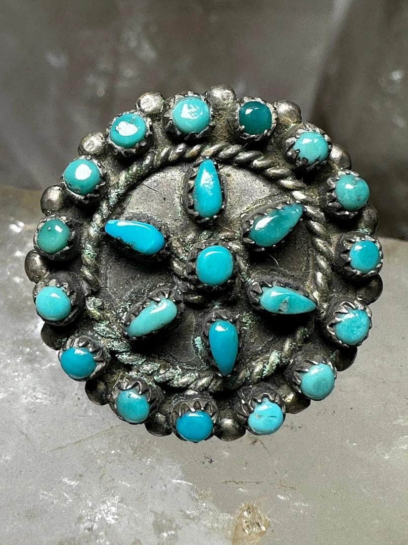 ZUNI RING TURQUOISE FLOWER SIZE 4.25 STERLING SILVER WOMEN: ZUNI RING TURQUOISE FLOWER SIZE 4.25 STERLING SILVER WOMEN Zuni ring turquoise flower size 4.25 sterling silver women Size 4.25 Weight. 4.2g Length 7/8" Widest 7/8" Thinnest pat of band 1/8"