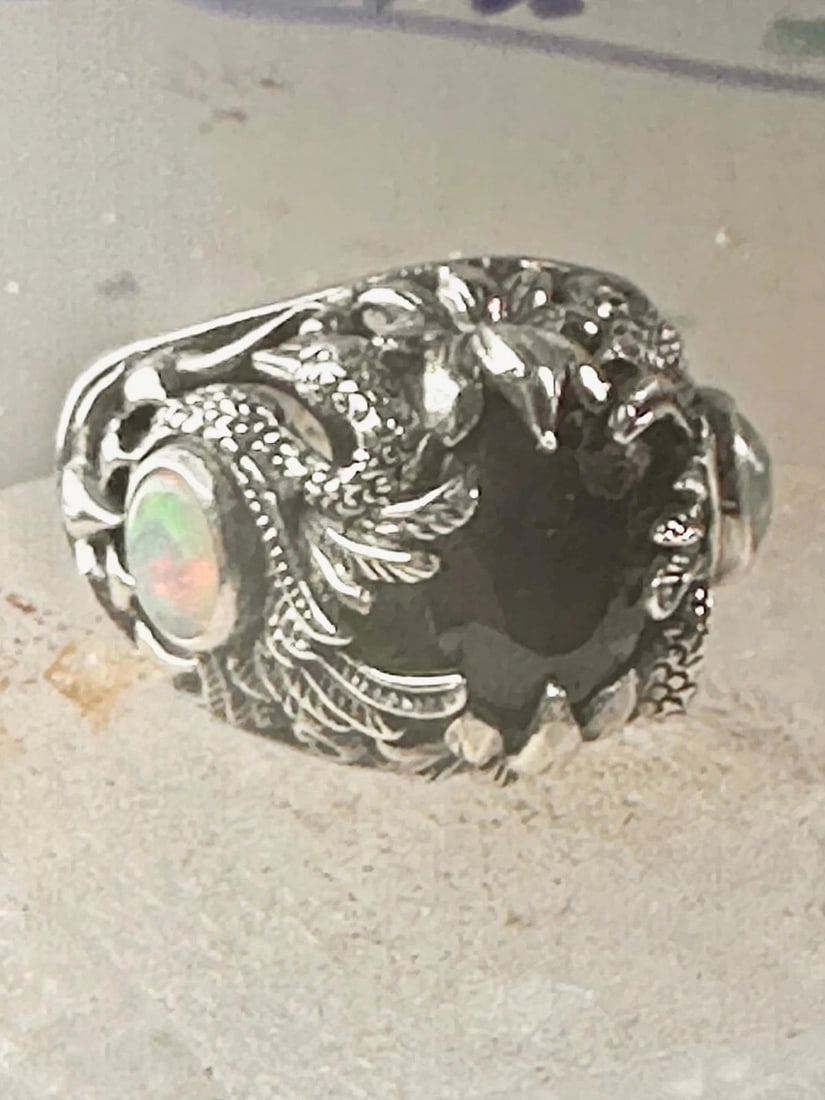 SWAN RING BIRD BAND LAB OPAL BLUE GLASS SIZE 6 STERLING SILVER WOMEN: SWAN RING BIRD BAND LAB OPAL BLUE GLASS SIZE 6 STERLING SILVER WOMEN Swan ring bird band lab opal blue glass size 6 sterling silver women Size 6 Weight 10.8g Width 1/8" Thinnest part of band 3/16"