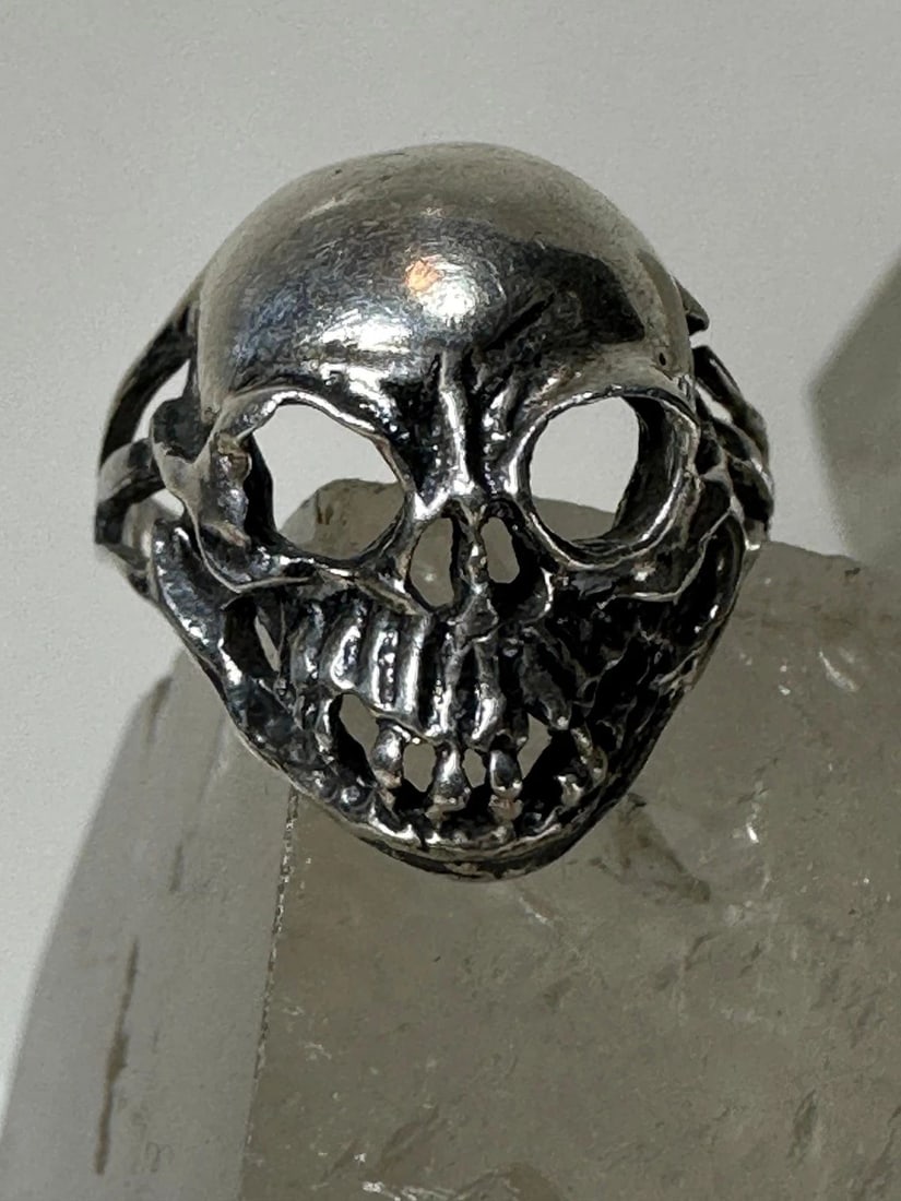 SKULL RING SIZE 6.75 STERLING SILVER BIKER WOMEN GIRLS: SKULL RING SIZE 6.75 STERLING SILVER BIKER WOMEN GIRLS Skull ring size 6.75 sterling silver biker women girls AS IS - The small band on the side is cut.. Wearable as is but a trip to the jewelers woul