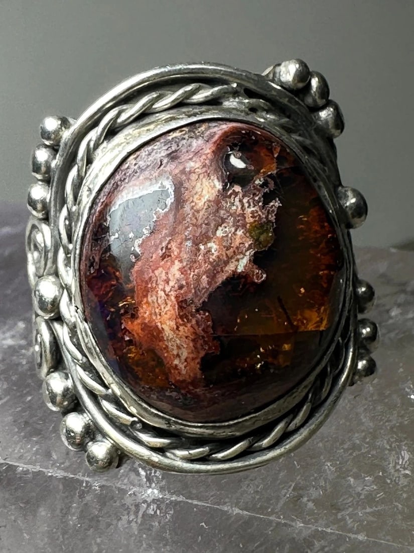 BOULDER OPAL RING BOHO SIZE 5.25 STERLING SILVER WOMEN: BOULDER OPAL RING BOHO SIZE 5.25 STERLING SILVER WOMEN Cantera Boulder Opal ring boho size 5.25 sterling silver women Size 5.25 Between a size 5.25 and a size 5.50 Weight. 12.2g Length 1" Width. 7/8" 