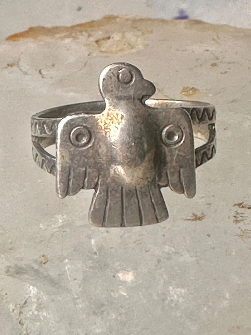 PHOENIX RING THUNDERBIRD NAVAJO BAND SIZE 7.5 STERLING SILVER WOMEN GIRLS PINKY: PHOENIX RING THUNDERBIRD NAVAJO BAND SIZE 7.5 STERLING SILVER WOMEN GIRLS PINKY Phoenix ring Navajo Thunderbird band size 7.5 sterling silver women girls pinky Size 7.5 Between a size 7.50 and a size 