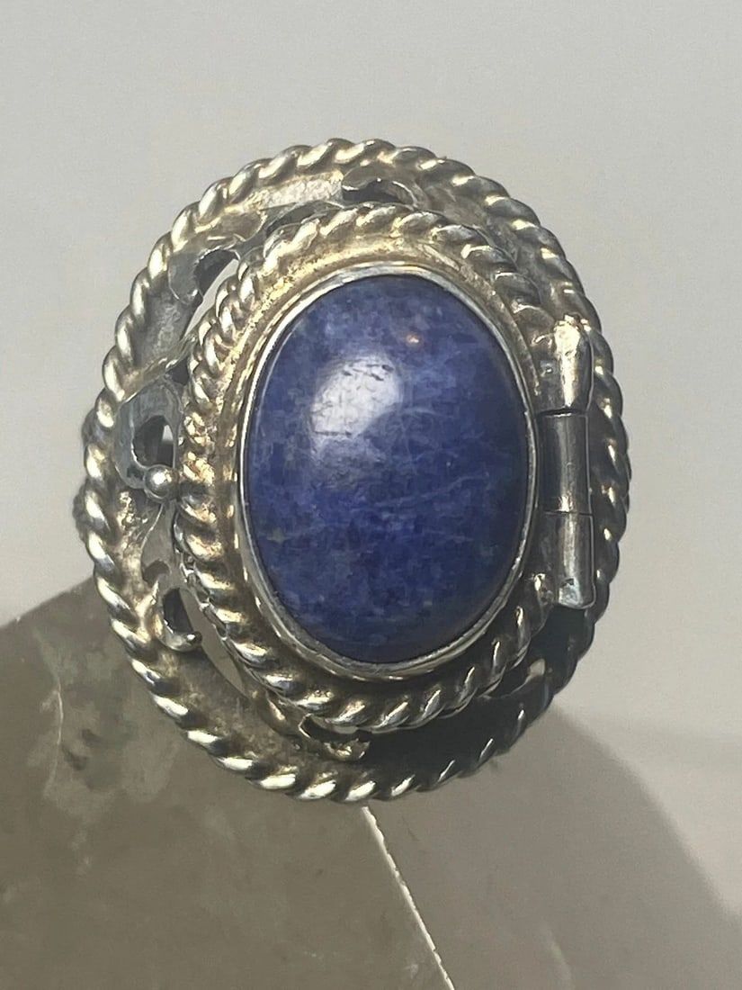 BLUE LAPIS? POISON RING MEXICO LOCKET SOUTHWEST BAND STERLING SILVER WOMEN: BLUE LAPIS? POISON RING MEXICO LOCKET SOUTHWEST BAND STERLING SILVER WOMEN Blue poison ring Mexico locket southwest band sterling silver women Size 5.50 adjustable Weight 8.8g Length 1" Widest part 3/
