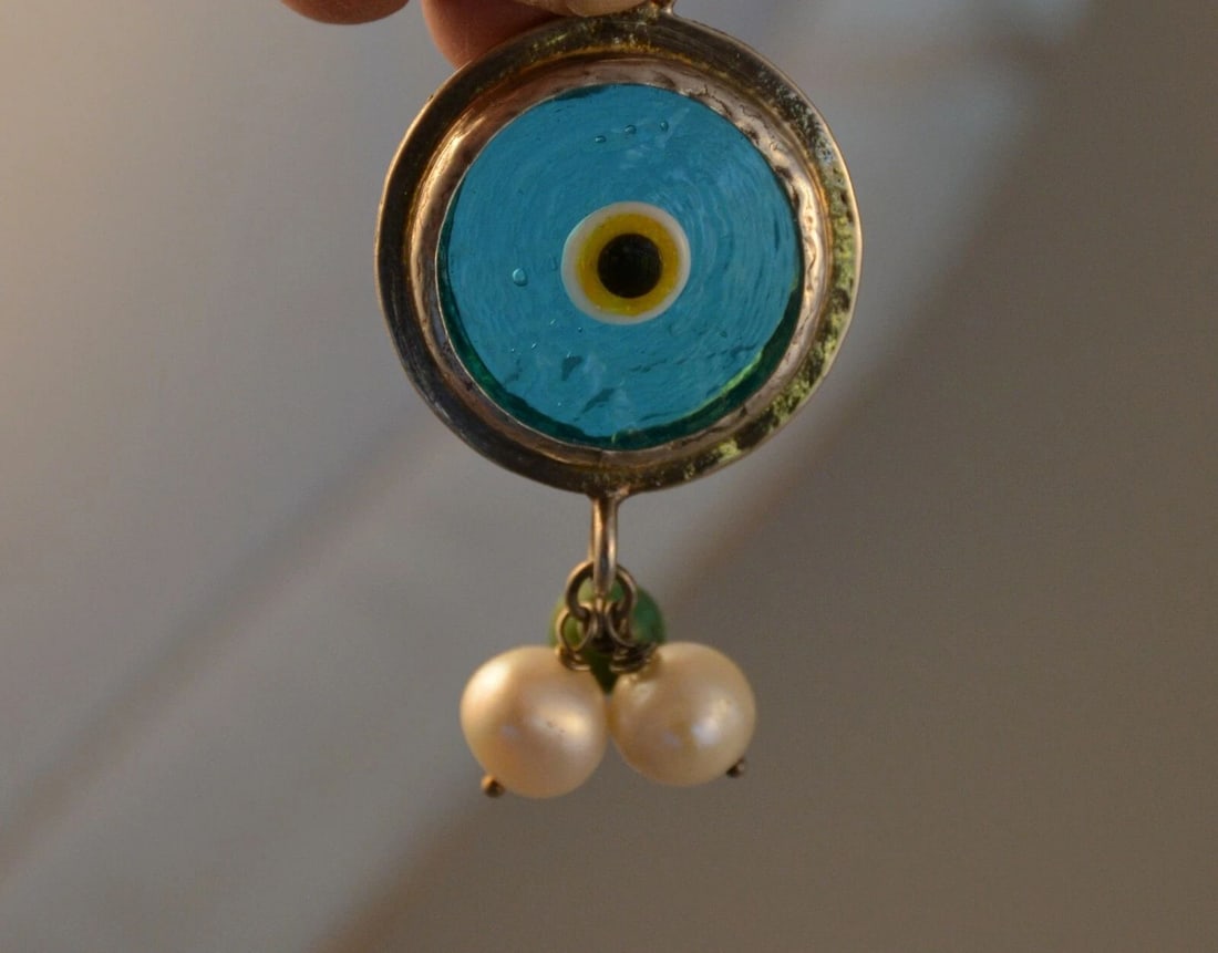HANDCRAFTED STERLING TURQUOISE AMULET PENDANT PEARLS - EVIL EYE PROTECTION LUCK: HANDCRAFTED STERLING TURQUOISE AMULET PENDANT PEARLS - EVIL EYE PROTECTION LUCK Item Description: This amulet pendant has been handcrafted of sterling silver with turquoise glass at the center. The ye