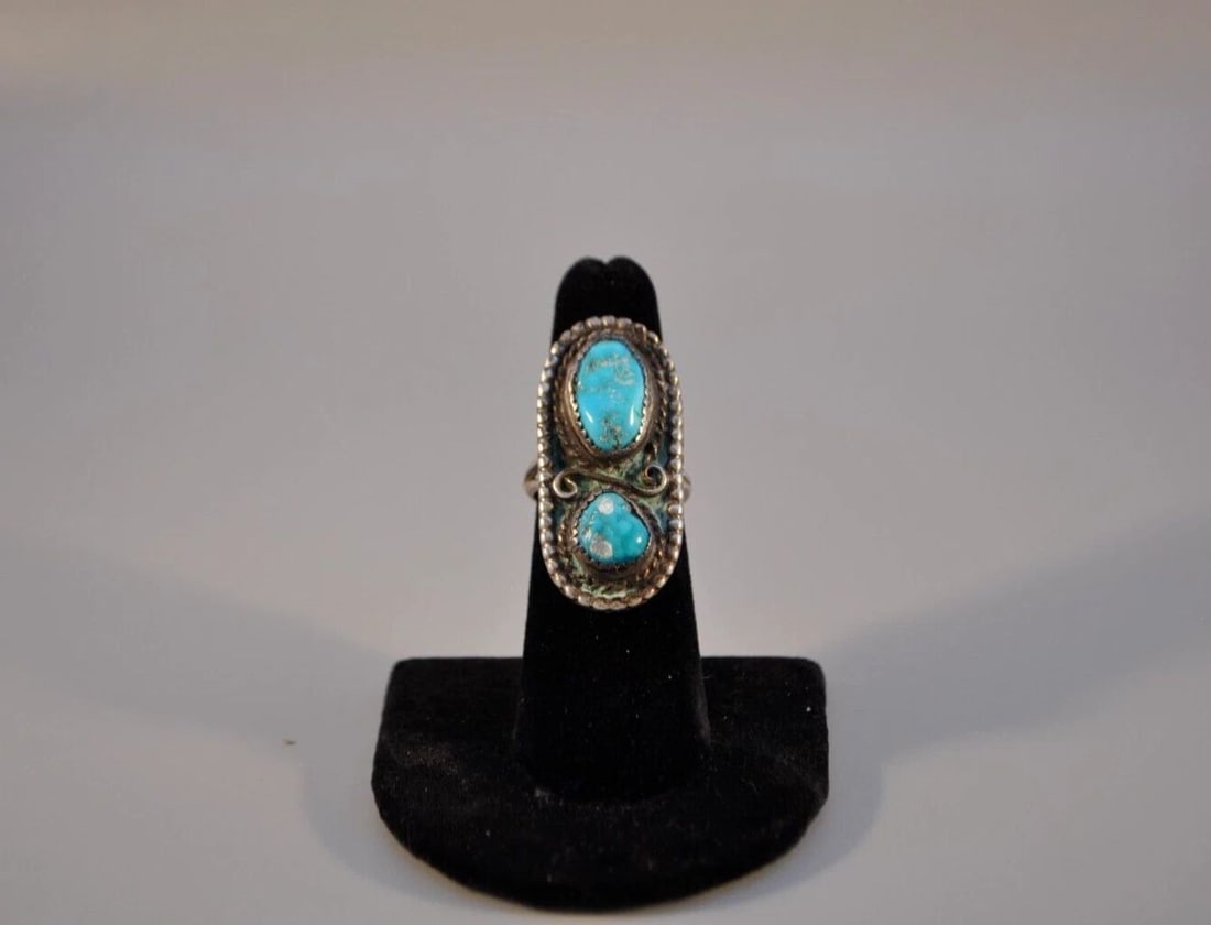 OLD PAWN NAVAJO STERLING SILVER RING - TURQUOISE SIZE 6: OLD PAWN NAVAJO STERLING SILVER RING - TURQUOISE SIZE 6 Weight 9.49 Grams 1 1/2 " Tall Old Pawn Jewelry dates from the early 1900s to the 1970s. Most of it is not signed because it wasn't the Native A