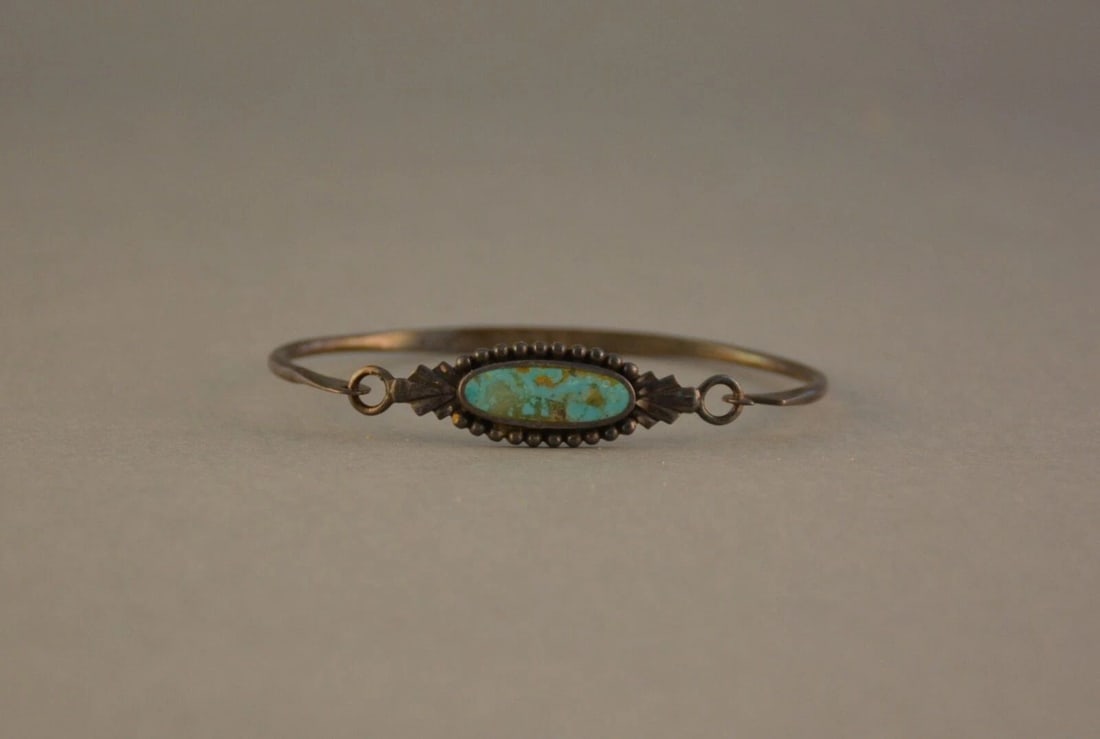 SOUTHWEST STERLING SILVER BANGLE BRACELET - TURQUOISE - BOMA - 7 5/8": SOUTHWEST STERLING SILVER BANGLE BRACELET - TURQUOISE - BOMA - 7 5/8" Item Description: This vintage sterling silver bangle bracelet has been set with an attractive turquoise stone. It has a hook clos