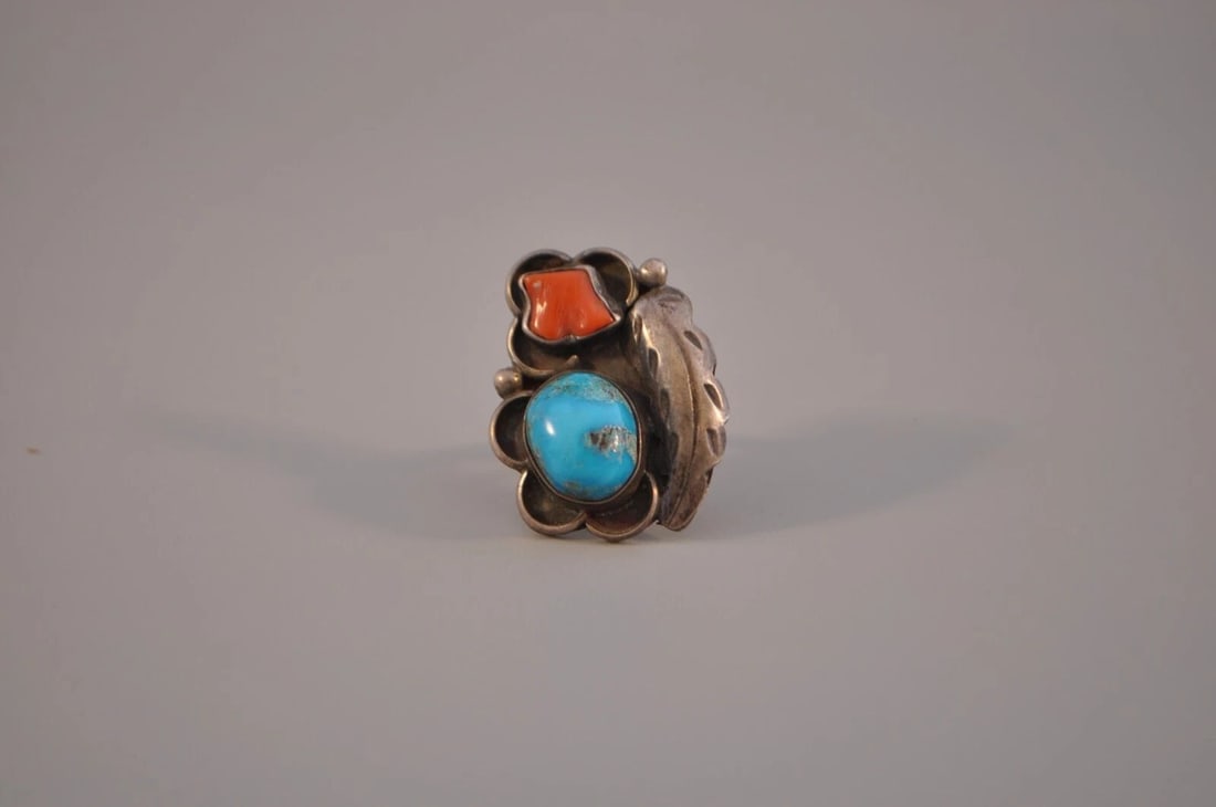 OLD PAWN NAVAJO STERLING SILVER RING - TURQUOISE /CORAL SIZE 6 1/2: OLD PAWN NAVAJO STERLING SILVER RING - TURQUOISE /CORAL SIZE 6 1/2 Weight 8.10 Grams 1 1/4" Tall Old Pawn Jewelry dates from the early 1900s to the 1970s. Most of it is not signed because it wasn't th