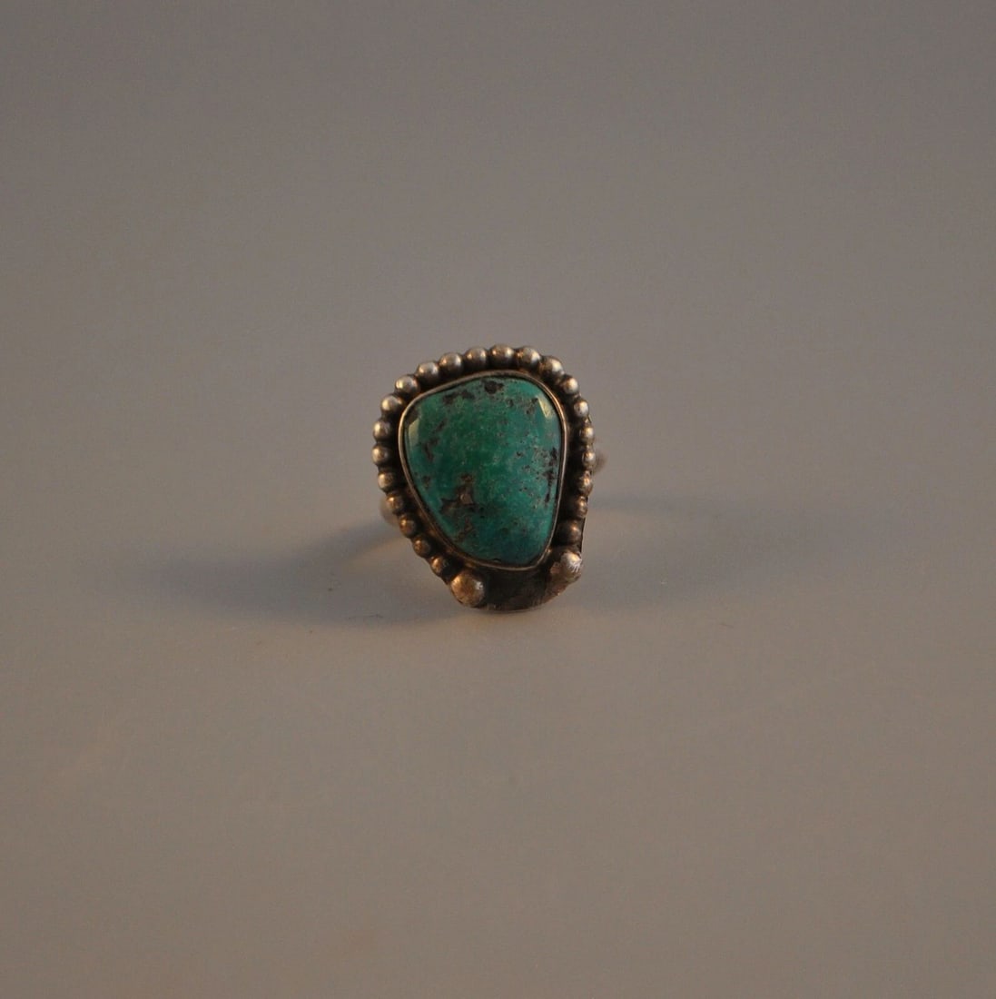 OLD PAWN NAVAJO INDIAN SILVER RING - LOVELY GREEN TURQUOISE STONE - SZ. 6 1/2: OLD PAWN NAVAJO INDIAN SILVER RING - LOVELY GREEN TURQUOISE STONE - SZ. 6 1/2 Item Description: This vintage Navajo silver ring is set with a beautiful green turquoise stone and surrounded with silver