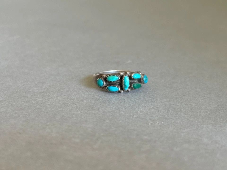 OLD PAWN ZUNI STERLING SILVER AND TURQUOISE RING. SIZE 5 3/4: OLD PAWN ZUNI STERLING SILVER AND TURQUOISE RING. SIZE 5 3/4 Old Pawn Zuni Sterling Silver and Turquoise Ring. Size 5 3/4 ..1/4 " Tall