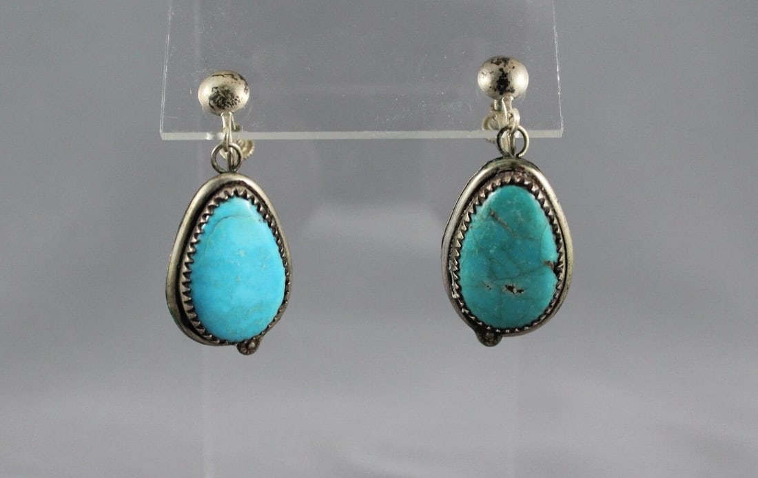 OLD PAWN NAVAJO INDIAN SILVER 1 5/8" DANGLE EARRINGS - TURQUOISE - SCREW-BACKS: OLD PAWN NAVAJO INDIAN SILVER 1 5/8" DANGLE EARRINGS - TURQUOISE - SCREW-BACKS Item Description: This pair of vintage Navajo Sterling Silver earrings have vibrant blue turquoise stones set into serrat