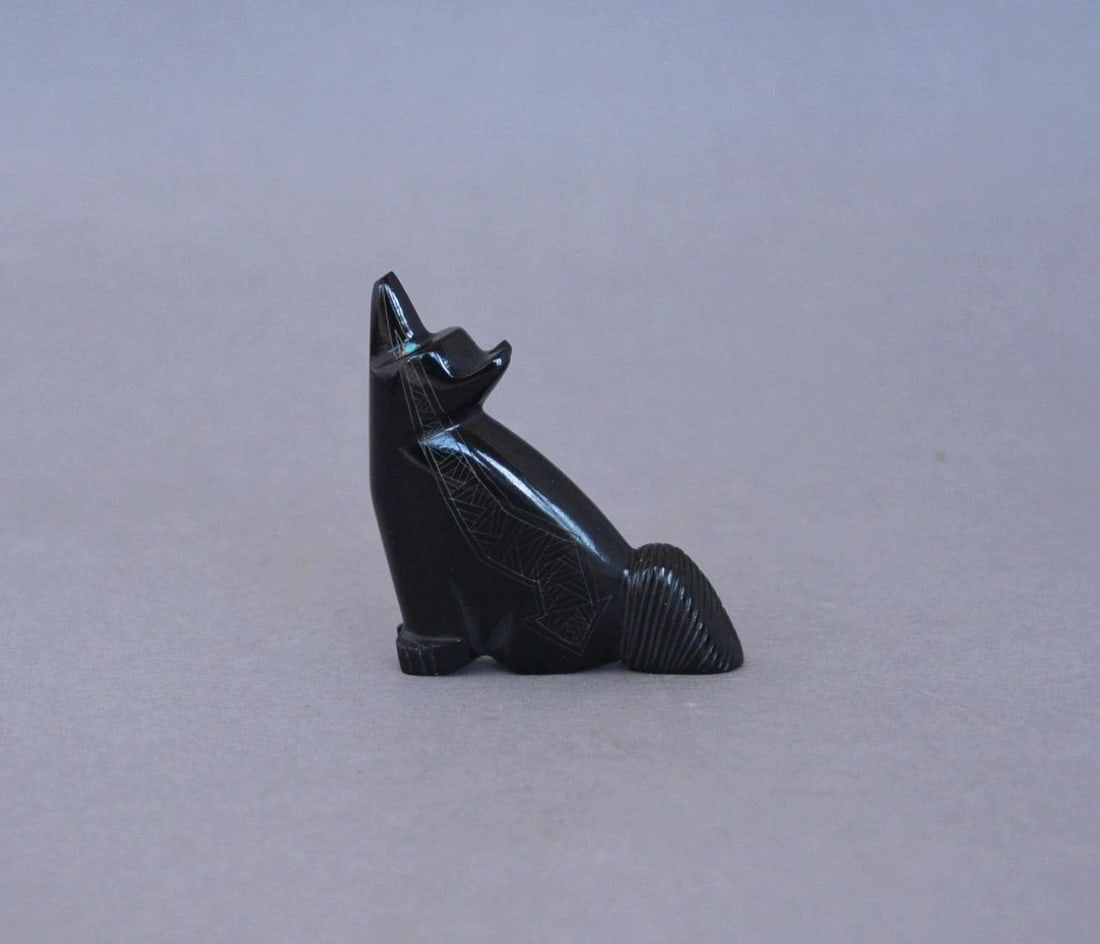 VINTAGE ZUNI FETISH CARVING - BLACK COYOTE INLAID TURQUOISE - HEARTLINE - SIGNED: VINTAGE ZUNI FETISH CARVING - BLACK COYOTE INLAID TURQUOISE - HEARTLINE - SIGNED This vintage fetish has been beautifully hand carved and signed by a Zuni artist. It stands 2 1/2" tall and is 1 3/4" l