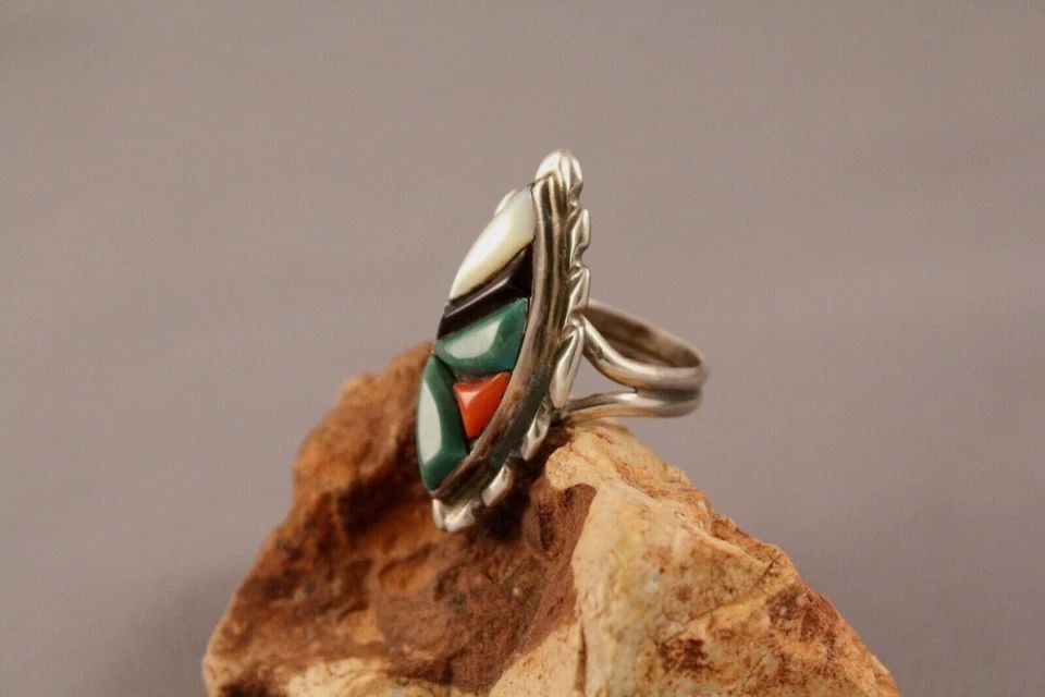 OLD PAWN ZUNI STERLING SILVER AND MULTI STONE RING SIZE 6 3/4: OLD PAWN ZUNI STERLING SILVER AND MULTI STONE RING SIZE 6 3/4 Item Description: 1 1/4" tall Older sterling Zuni Channel Inlayed Ring Size 6 3/4
