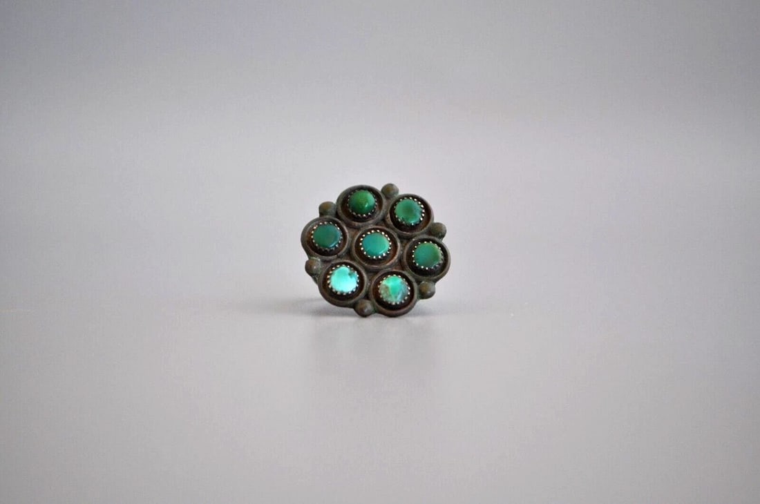 OLD PAWN ZUNI SILVER RING - TURQUOISE SIZE 6 3/4: OLD PAWN ZUNI SILVER RING - TURQUOISE SIZE 6 3/4 Weight 5.34 Grams 1 " Tall Old Pawn Jewelry dates from the early 1900s to the 1970s. Most of it is not signed because it wasn't the Native American tra