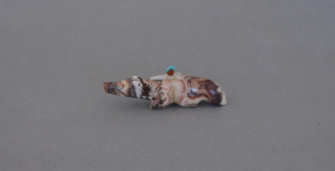 VINTAGE ZUNI FETISH - FOX - TURQUOISE CORAL ARROWHEAD BUNDLE - 3" LONG: VINTAGE ZUNI FETISH - FOX - TURQUOISE CORAL ARROWHEAD BUNDLE - 3" LONG This vintage Zuni fetish has been beautifully carved and tied with a white shell arrowhead, turquoise, coral bundle. It is 3 1/8"