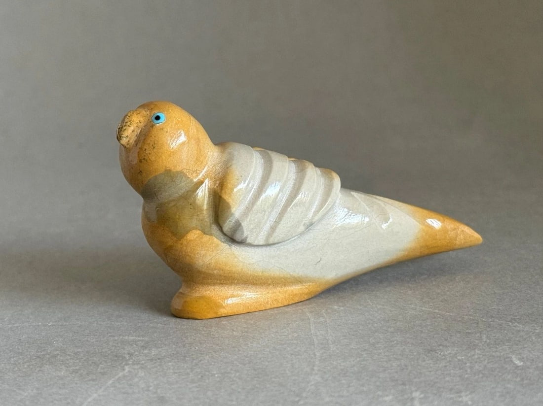 VINTAGE ZUNI BIRD FETISH SOAPSTONE W TURQUOISE EYES SIGNED D LEEKYA: VINTAGE ZUNI BIRD FETISH SOAPSTONE W TURQUOISE EYES SIGNED D LEEKYA Vintage Zuni Bird Fetish Soapstone w Turquoise Eyes Signed Delvin Leekya Nose has chip on it ..3 1/2" Long ..