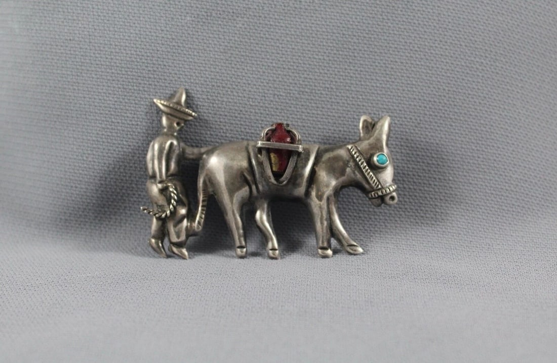 OLD MEXICAN STERLING DONKEY PIN TURQUOISE AND POT 2 1/8 " WIDE: OLD MEXICAN STERLING DONKEY PIN TURQUOISE AND POT 2 1/8 " WIDE Item Description: 2 1/8” w x 1 1/2” h
