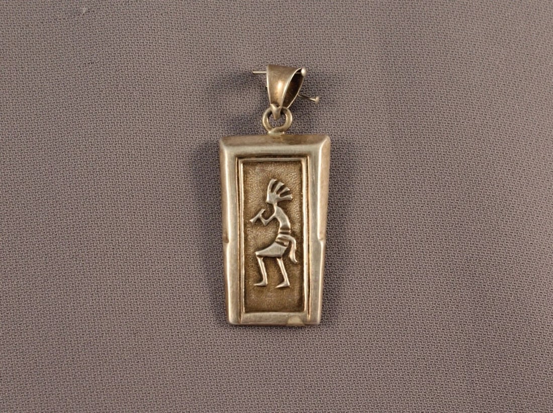 VINTAGE NAVAJO STERLING SILVER KOKOPELLI PENDANT: VINTAGE NAVAJO STERLING SILVER KOKOPELLI PENDANT Item Description: 2” h x 3/4” w