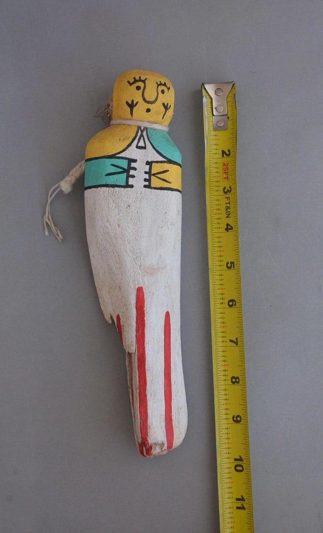 VINTAGE HOPI KACHINA - 9 3/4" TALL - THE QOQOTE STORYTELLER KACHINA: VINTAGE HOPI KACHINA - 9 3/4" TALL - THE QOQOTE STORYTELLER KACHINA Item Description: This is a vintage Qoqote or storyteller kachina. It is 9 3/4" tall. It is identified on the back as the Qoqote and