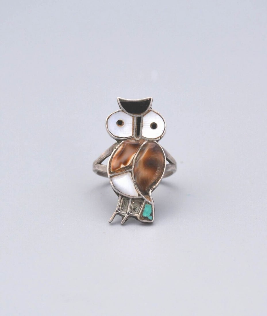OLD PAWN ZUNI RING STERLING SILVER AND INLAID TURQUOISE, SHELL, ONYX SIZE 6.5: OLD PAWN ZUNI RING STERLING SILVER AND INLAID TURQUOISE, SHELL, ONYX SIZE 6.5 Item Description: 1 1/8" tall. Ring size is 6.5. This lovely vintage Zuni silver inlay owl ring is in great condition.