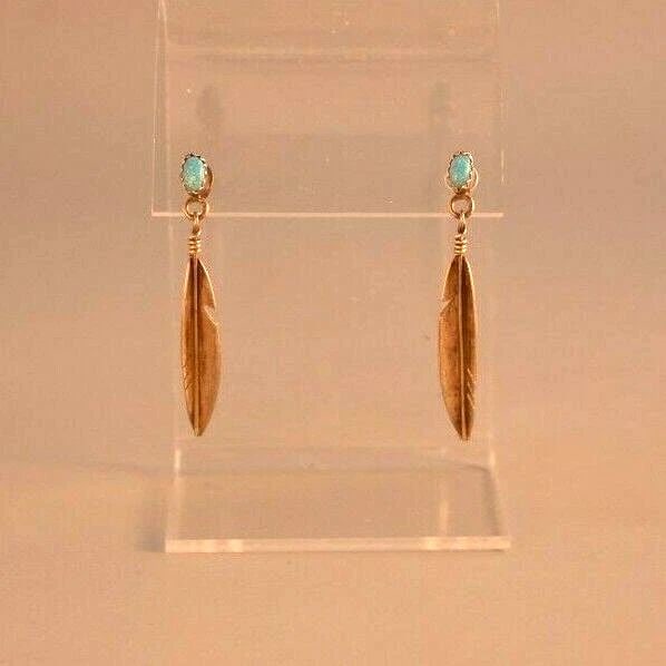VINTAGE NAVAJO INDIAN STERLING SILVER FEATHER EARRINGS - BLUE OPAL - 1 3/4" DROP: VINTAGE NAVAJO INDIAN STERLING SILVER FEATHER EARRINGS - BLUE OPAL - 1 3/4" DROP Item Description: This pair of Navajo sterling silver earrings have been set with blue opal stones and measure 1 3/4" l