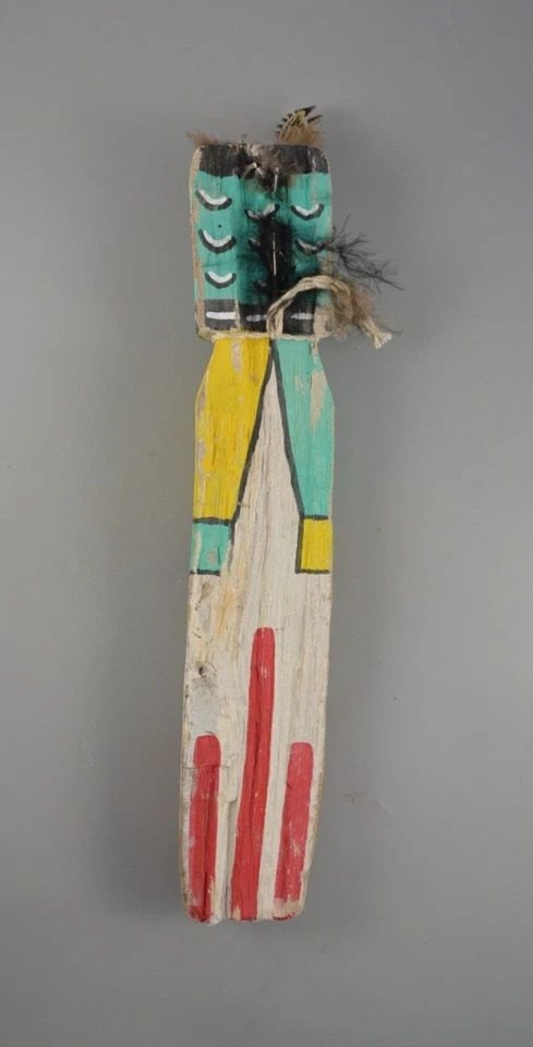 VINTAGE HOPI FLAT KACHINA - CRADLE DOLL - 13" TALL: VINTAGE HOPI FLAT KACHINA - CRADLE DOLL - 13" TALL Item Description: This is a vintage flat Hopi kachina cradle doll. This doll is missing the nose and an ear at each side. 13" Tall