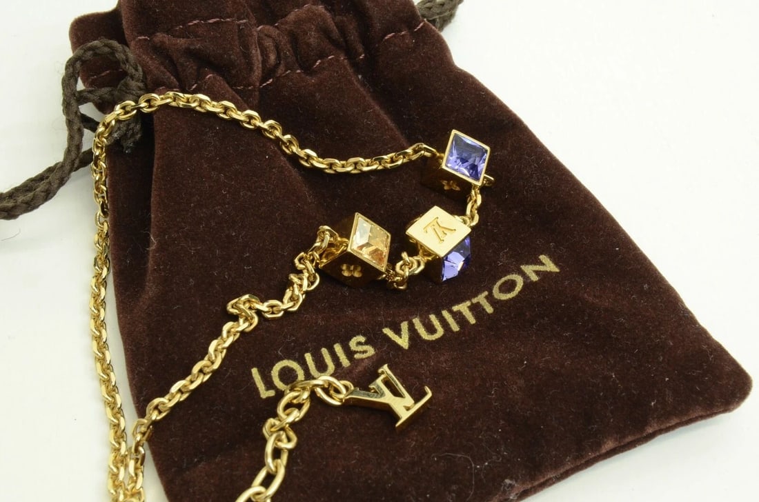 AUTHENTIC LOUIS VUITTON WHITE PURPLE GEMSTONE CUBE CHARM LOGO MONOGRAM NECKLACE: AUTHENTIC LOUIS VUITTON WHITE PURPLE GEMSTONE CUBE CHARM LOGO MONOGRAM NECKLACE Authentic Louis Vuitton White Purple Gemstone Cube Charm Logo Monogram Necklace AUTHENTIC LOUIS VUITTON WHITE PURPLE GEM