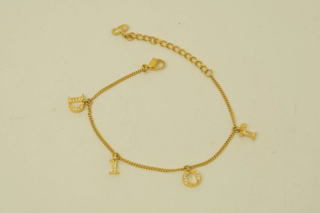 AUTHENTIC CHRISTIAN DIOR LETTERS BRACELET GP CHARM RHINESTONE JEWELRY ACCESSORY: AUTHENTIC CHRISTIAN DIOR LETTERS BRACELET GP CHARM RHINESTONE JEWELRY ACCESSORY Authentic Christian Dior Letters Bracelet GP Charm Rhinestone Jewelry Accessory Christian Dior Jewelry Accessory Ladies,