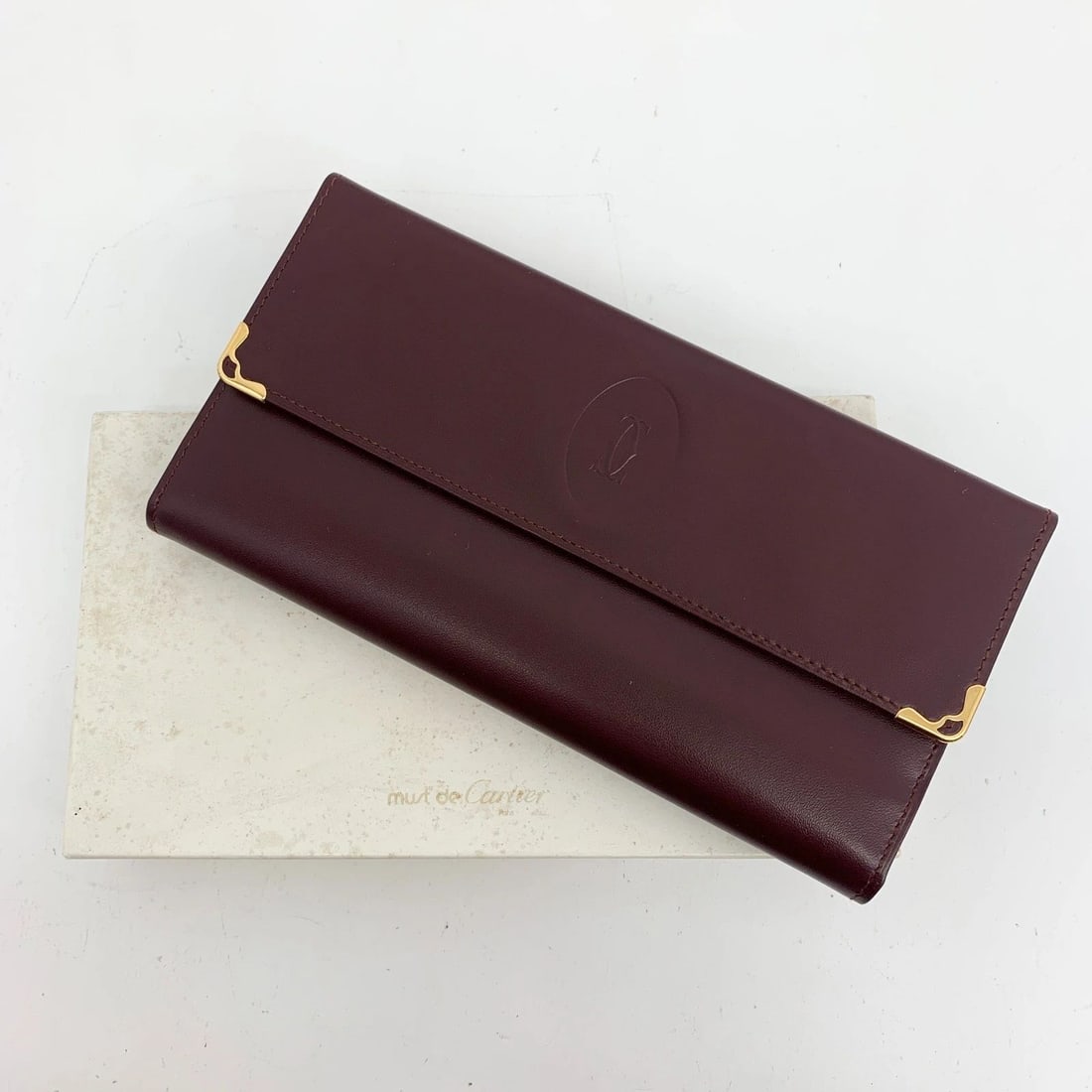 AUTHENTIC CARTIER BURGUNDY LEATHER CLUTCH CLIP WALLET LOGO GP VINTAGE COIN CASE: AUTHENTIC CARTIER BURGUNDY LEATHER CLUTCH CLIP WALLET LOGO GP VINTAGE COIN CASE AUTHENTIC CARTIER BURGUNDY LEATHER CLUTCH CLIP WALLET LOGO GP VINTAGE COIN CASE