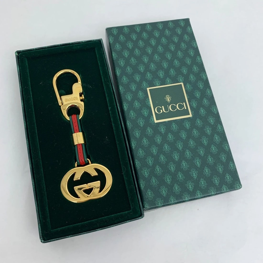 AUTHENTIC GUCCI GG LOGO KEYCHAIN CLASSIC GP CHARM WEB STRIPE JEWELRY ACCESSORY: AUTHENTIC GUCCI GG LOGO KEYCHAIN CLASSIC GP CHARM WEB STRIPE JEWELRY ACCESSORY AUTHENTIC GUCCI GG LOGO KEYCHAIN CLASSIC GP CHARM WEB STRIPE JEWELRY ACCESSORY Gucci Anniversary Jewelry Accessory Oval K
