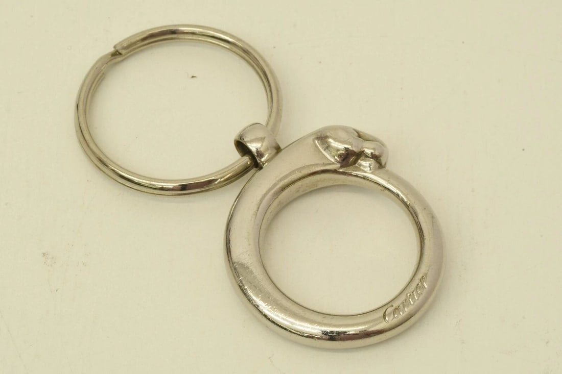 AUTHENTIC CARTIER PANTAIL CLASSIC SILVER PLATED LOGO KEYCHAIN ACCESSORY CHARM 2: AUTHENTIC CARTIER PANTAIL CLASSIC SILVER PLATED LOGO KEYCHAIN ACCESSORY CHARM 2 Authentic Cartier Pantail Classic Silver Plated Logo Keychain Accessory Charm 2 Authentic Cartier Pantail Classic Silver