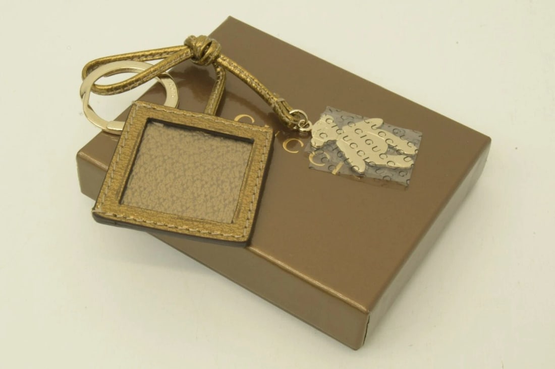 AUTHENTIC GUCCI PICTURE FRAME KEYCHAIN LEATHER SP AGED GOLD BEAR BAG ACCESSORY: AUTHENTIC GUCCI PICTURE FRAME KEYCHAIN LEATHER SP AGED GOLD BEAR BAG ACCESSORY Authentic Gucci Picture Frame Keychain Leather SP Aged Gold Bear Bag Accessory Authentic Gucci Picture Frame Keychain Lea