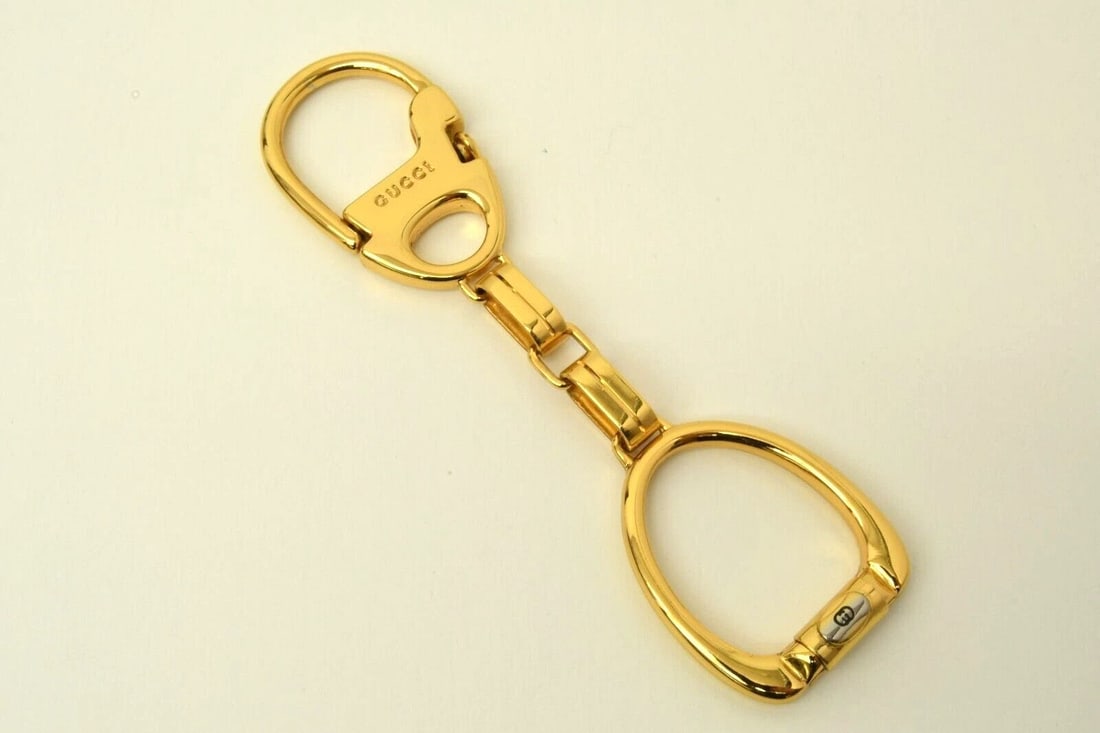 AUTHENTIC GUCCI ANNIVERSARY GOLD PLATED HANGING BELL KEYCHAIN JEWELRY ACCESSORY: AUTHENTIC GUCCI ANNIVERSARY GOLD PLATED HANGING BELL KEYCHAIN JEWELRY ACCESSORY Authentic Gucci Anniversary Gold Plated Hanging Bell Keychain Jewelry Accessory Authentic Gucci Anniversary Gold Plated 