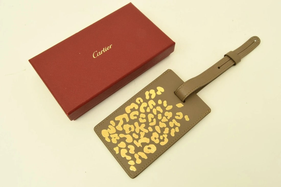 AUTHENTIC CARTIER DANGLING LEATHER ANIMAL PRINT GRAY/BROWN LUGGAGE TAG ACCESSORY: AUTHENTIC CARTIER DANGLING LEATHER ANIMAL PRINT GRAY/BROWN LUGGAGE TAG ACCESSORY Authentic Cartier Dangling Leather Animal Print Gray/Brown Luggage Tag Accessory Authentic Cartier Dangling Leather Ani