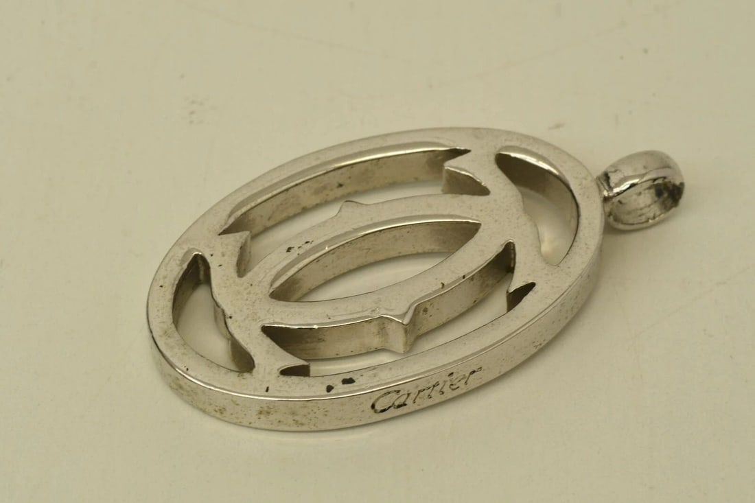 AUTHENTIC CARTIER DECOR LOGO CLASSIC SILVER CHARM SWISS MADE SIGNATURE ACCESSORY (1 of 2)